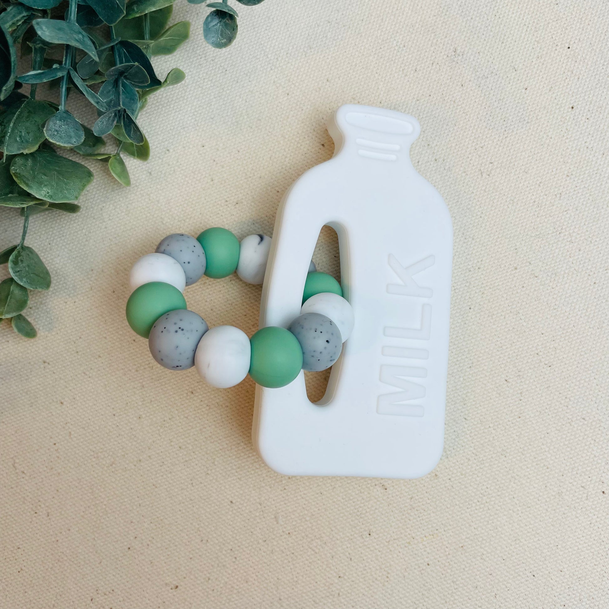 Milk teether shop